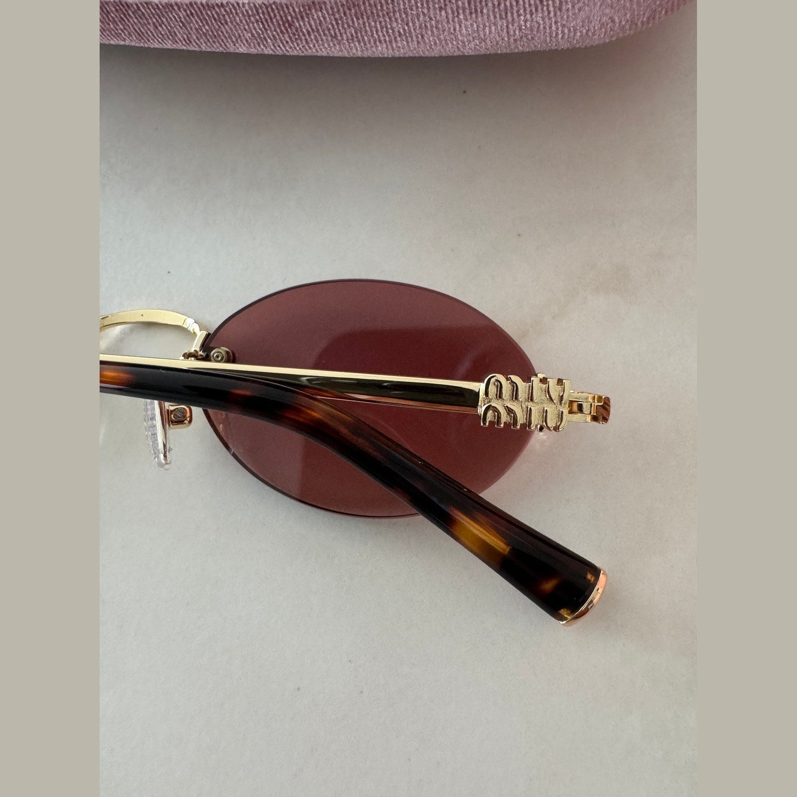מיו מיו Oval