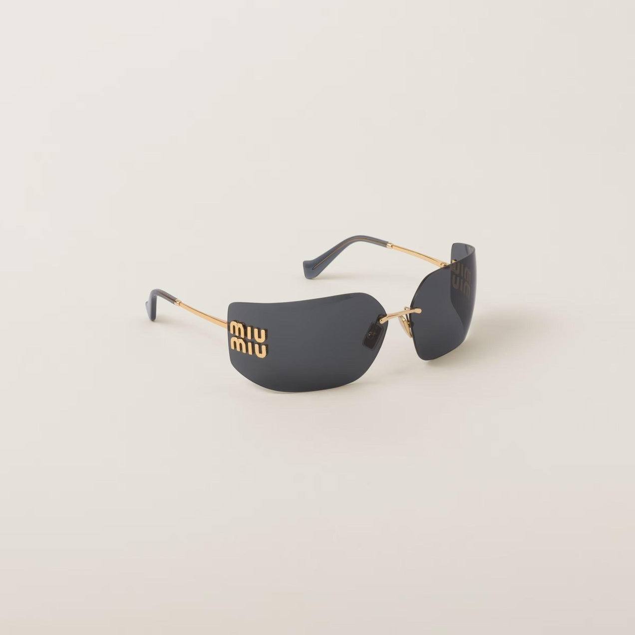 Miu Miu wide-screen gold metal sunglasses with frameless curved lenses and adjustable nose pads.