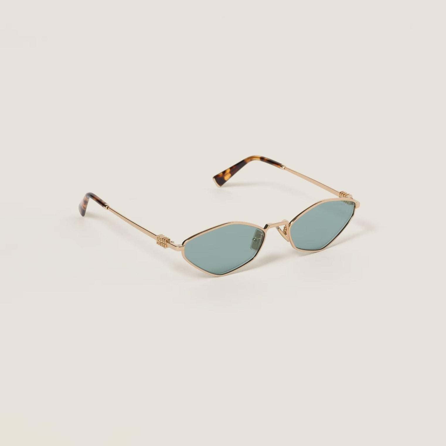 Image of Metal diamond-shaped Miu Miu sunglasses in rose gold with adjustable nose pads.