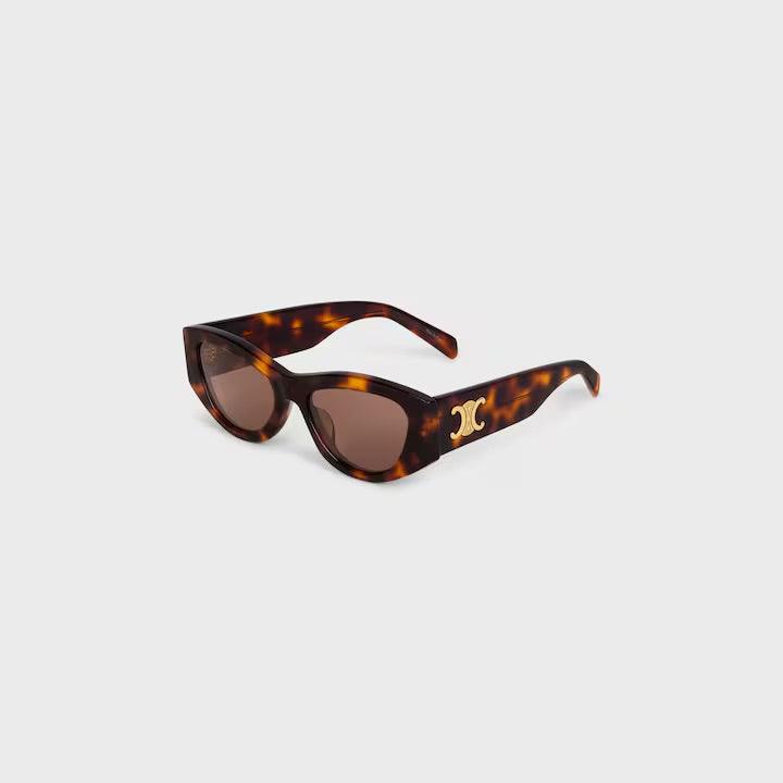 Image of Celine sunglasses with tortoiseshell frame and logo, elegant Parisian design.