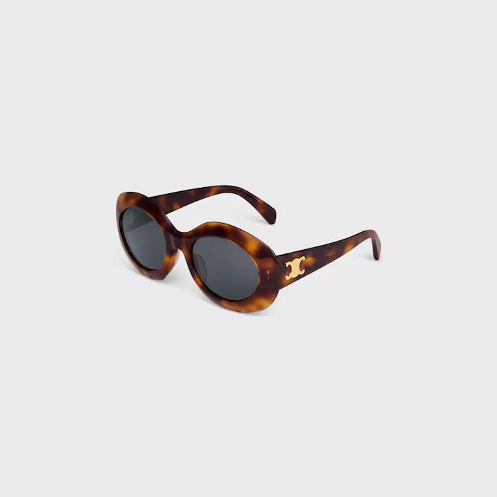 Image of Celine sunglasses with tortoiseshell frame and logo C, featuring round lenses and UV400 protection.