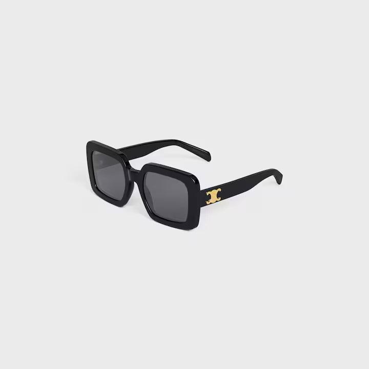 Celine sunglasses with black square frames and gold logo detailing on the temples.