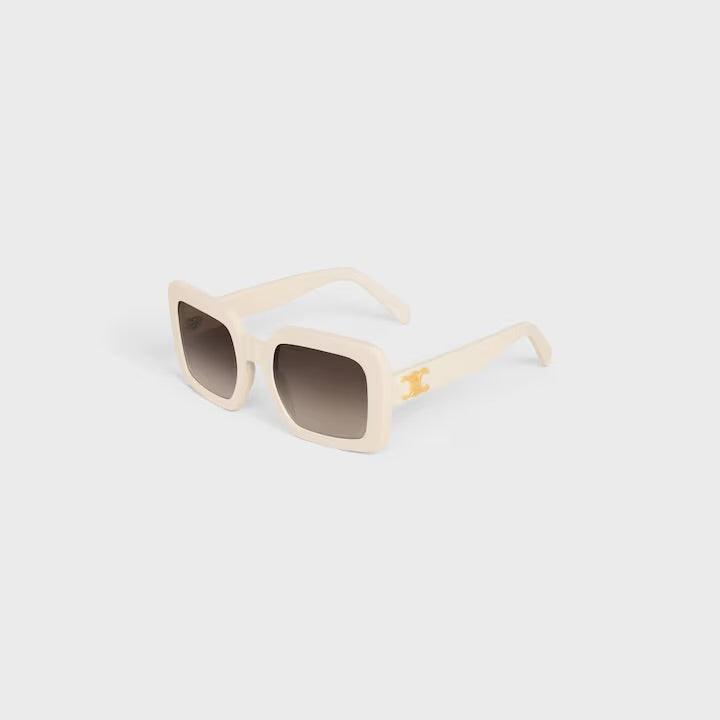 Image of Celine sunglasses with beige square frame and dark lenses, featuring signature subtle logo detailing.