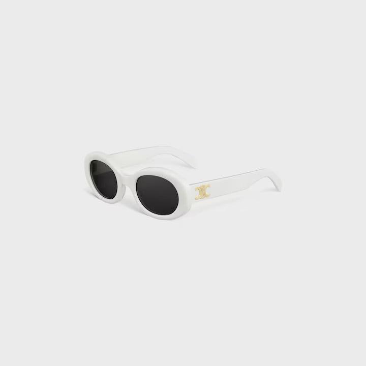 Image of Celine sunglasses with white oval frames and black lenses featuring logo on the side.