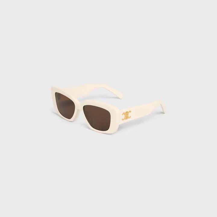 Celine logo sunglasses with sleek white frames and dark lenses on a light grey background.