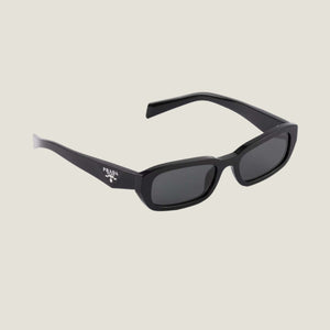 Prada logo sunglasses, black geometric frames, UV400 lenses.