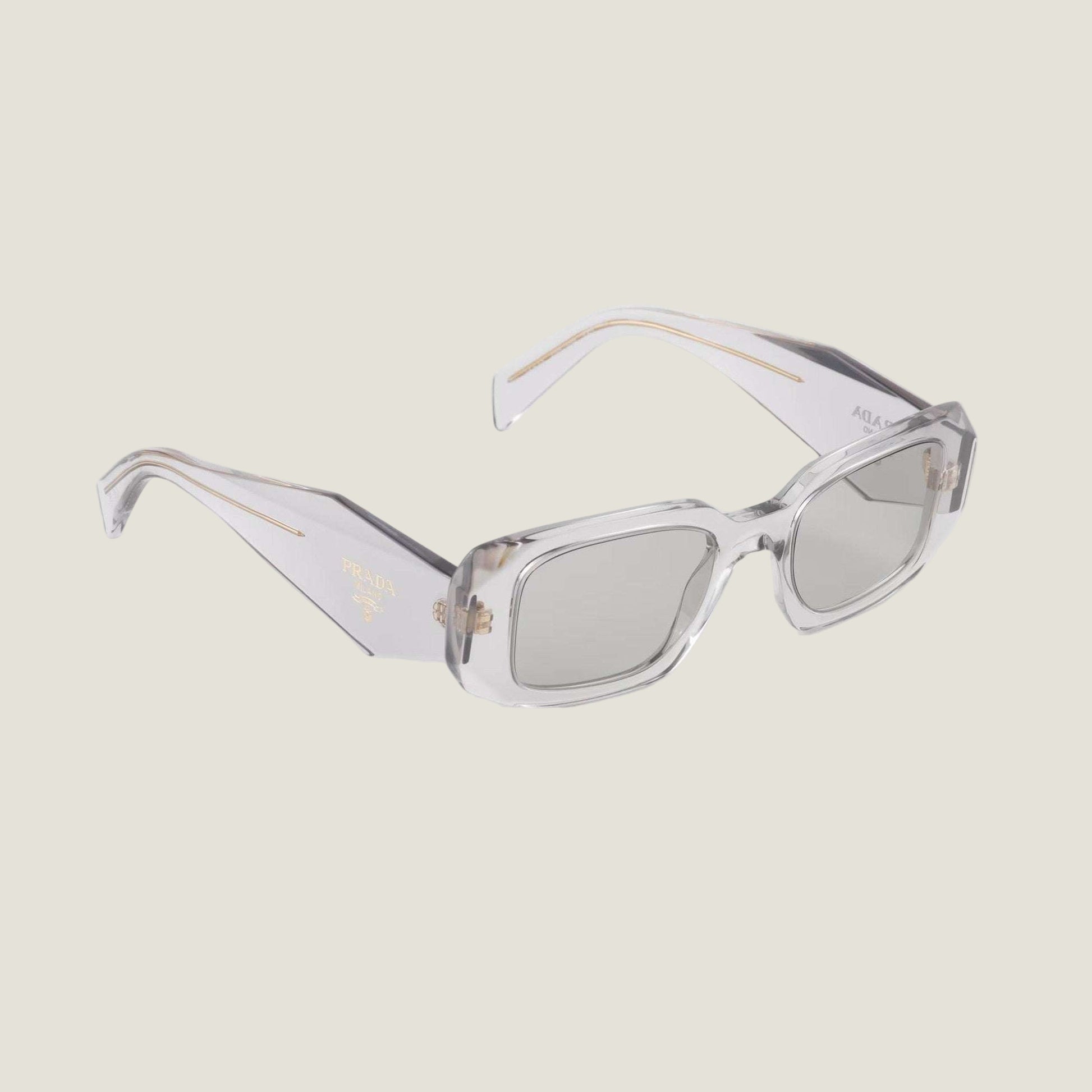 Prada luxury sunglasses with logo, geometric frame, and UV400 lenses.