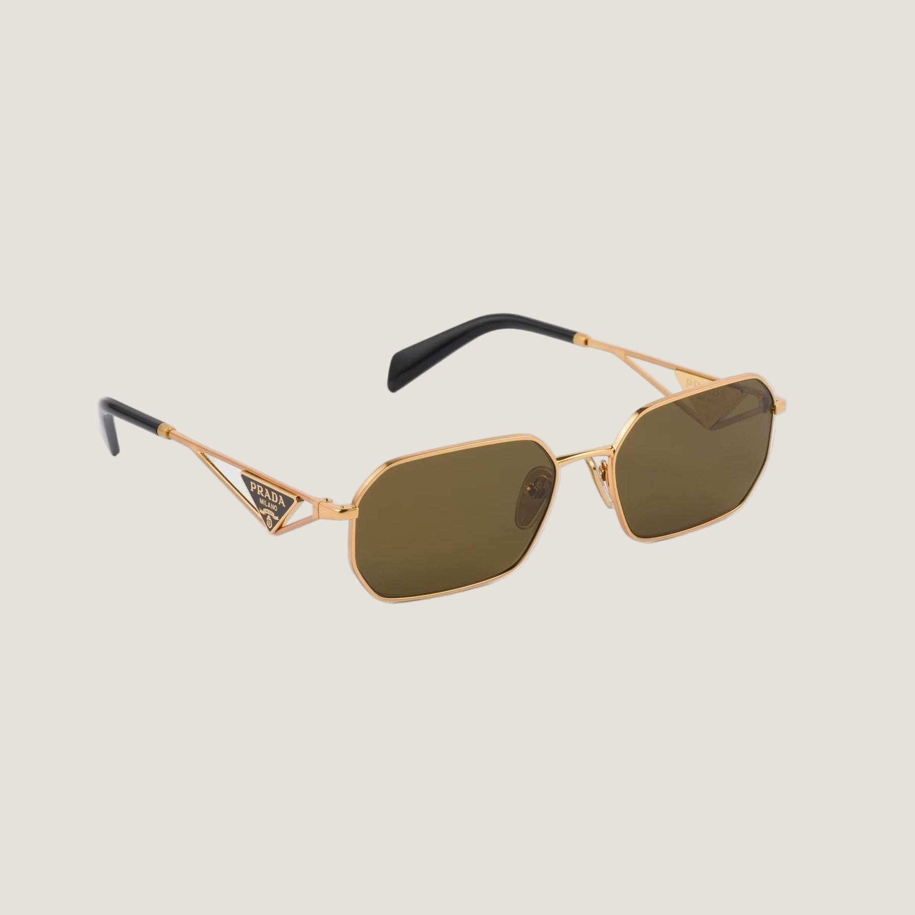 Image of Prada sunglasses with geometric frames and bold logo, showcasing luxury and contemporary elegance.