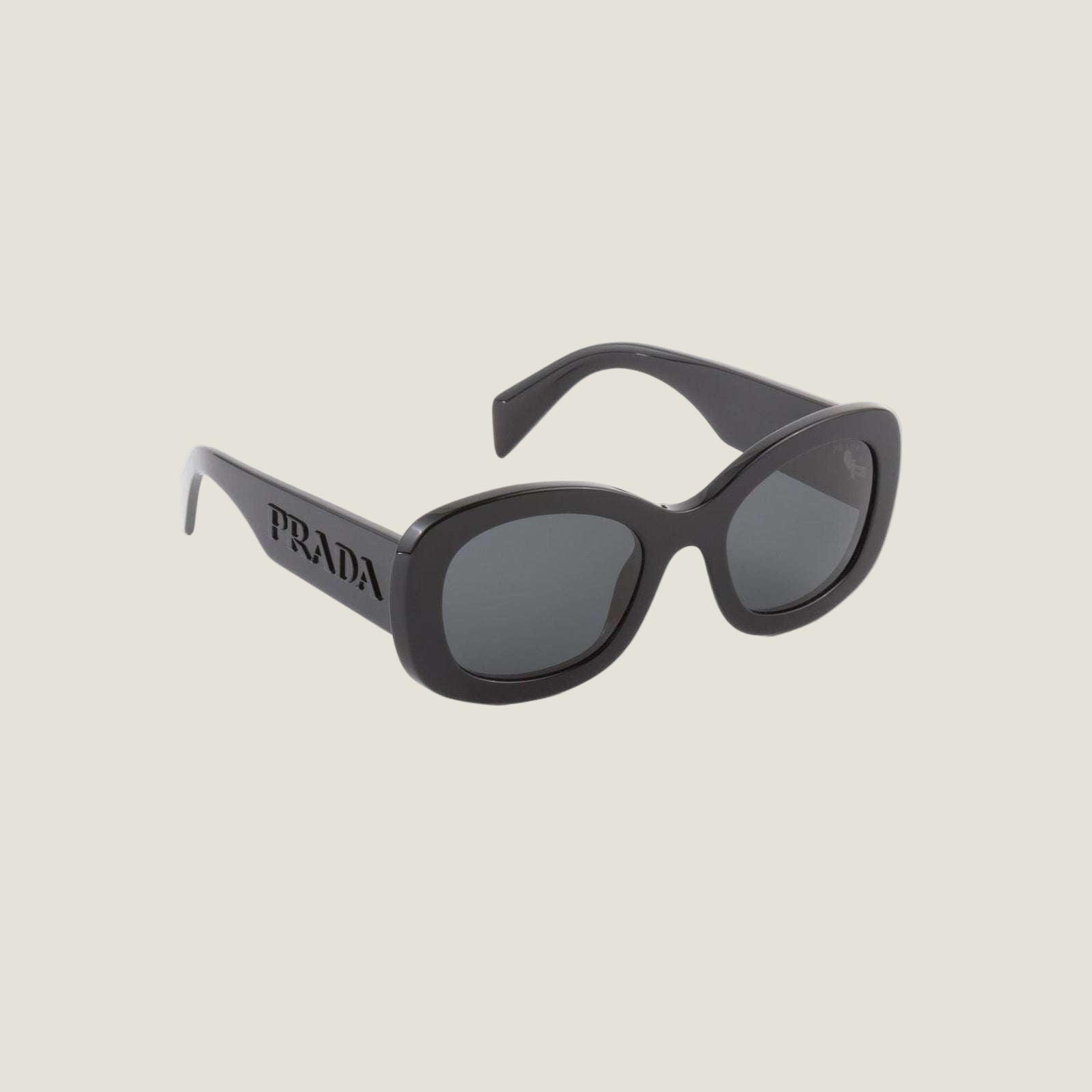 Image of Prada logo sunglasses with bold black frames and geometric design.