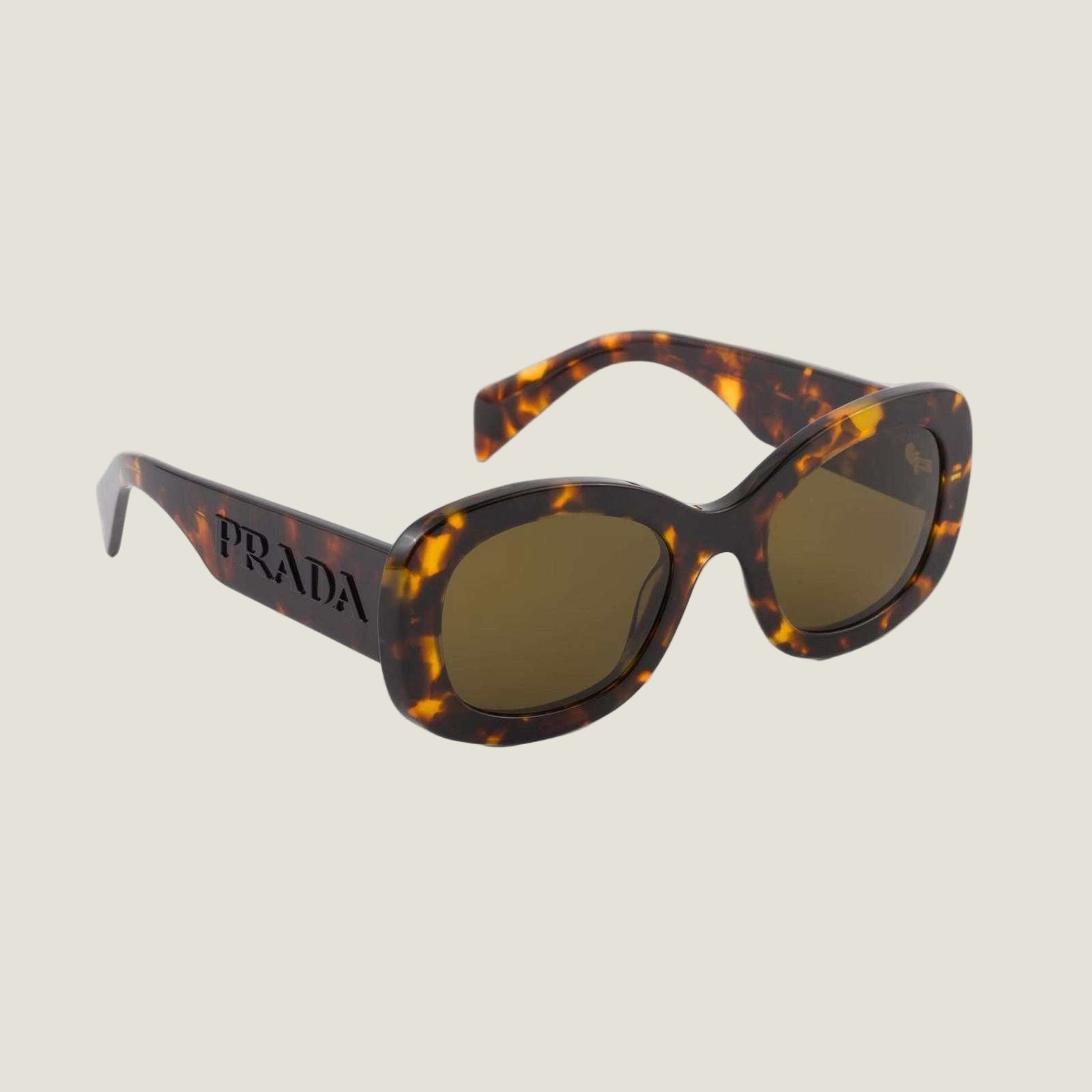 PRADA logo sunglasses with bold geometric frames and dark lenses.