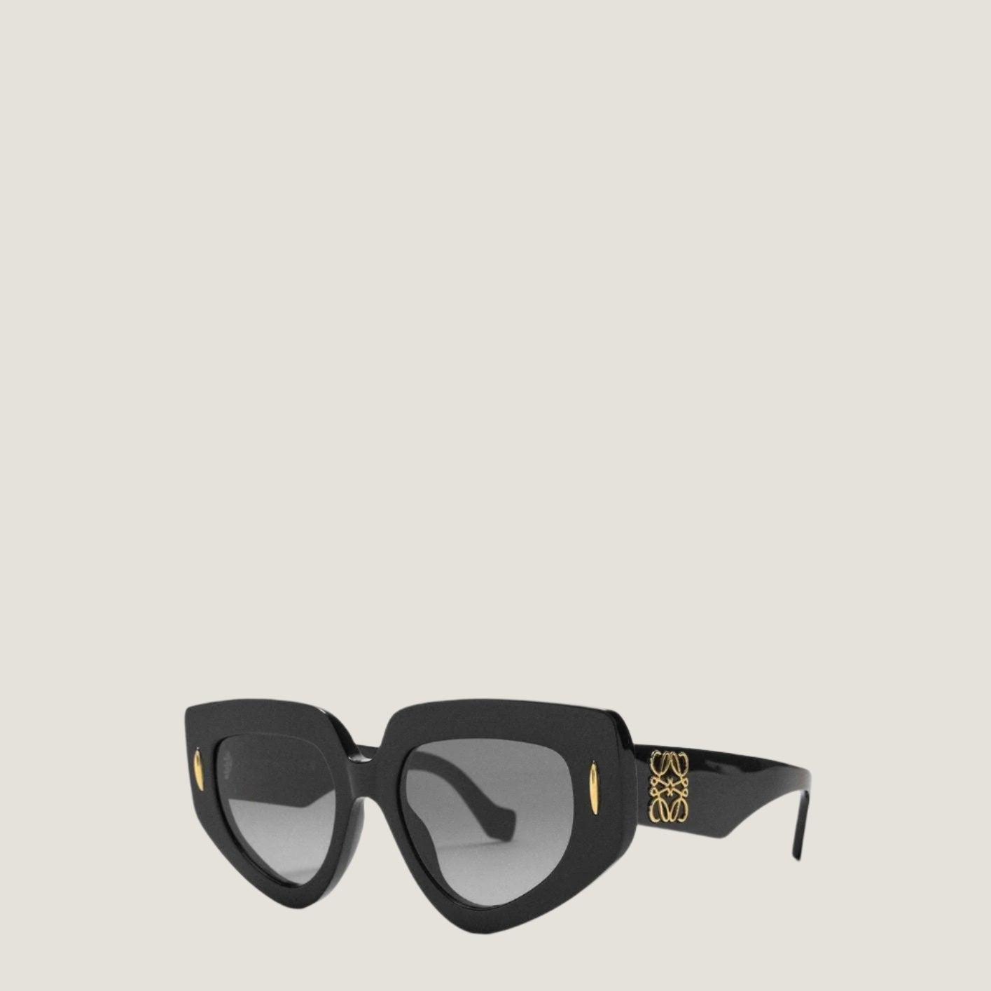 Modern LOEWE sunglasses with artistic geometric frames and UV400 protection.