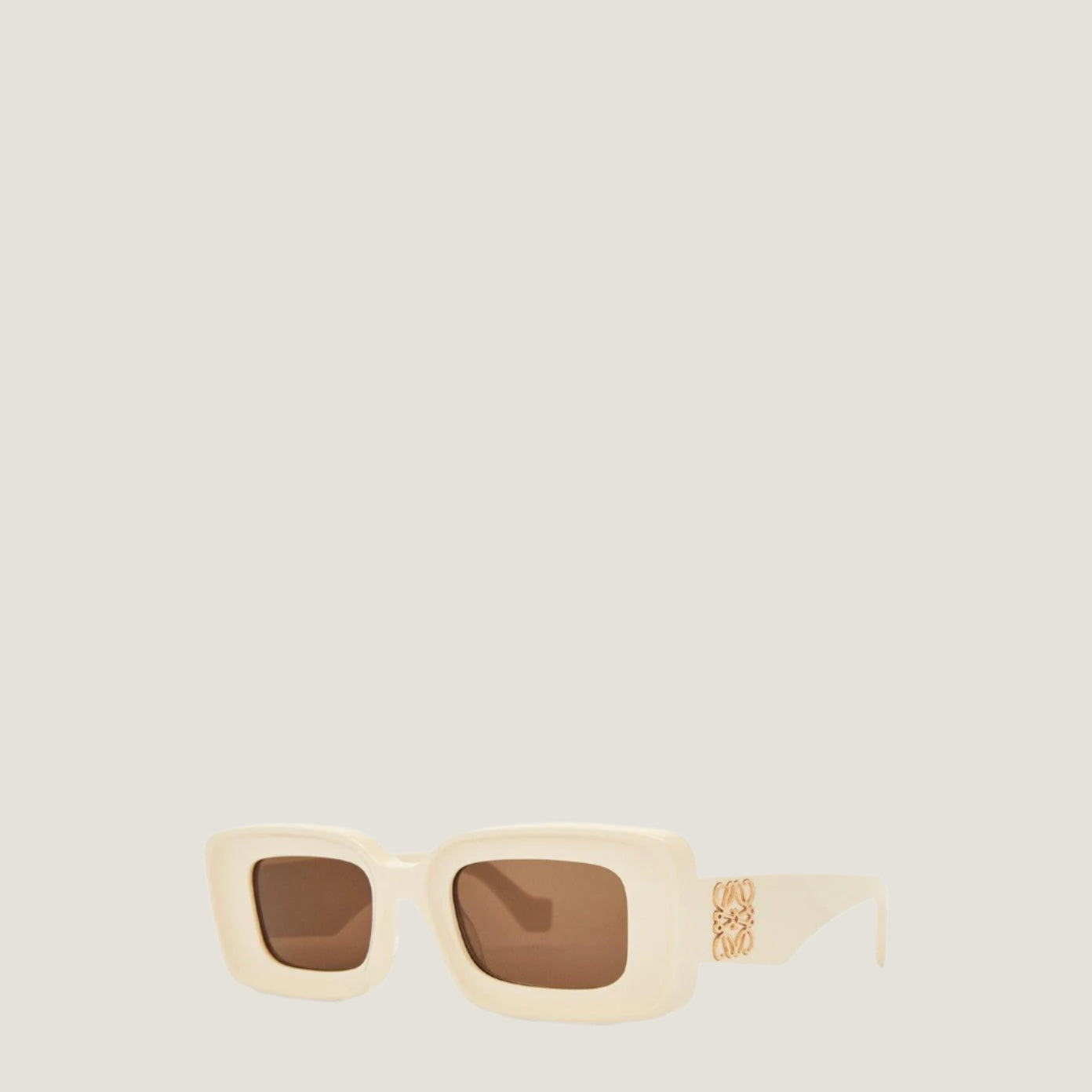 LOEWE sunglasses with geometric frame and brown lenses.