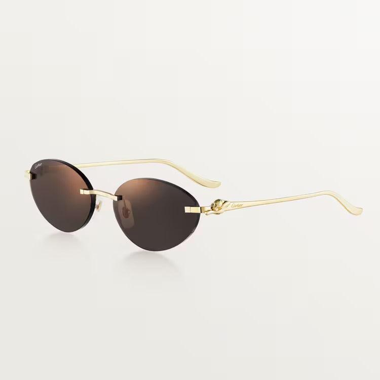 Image of Cartier sunglasses with gold-plated metal frame and UV400 lenses.