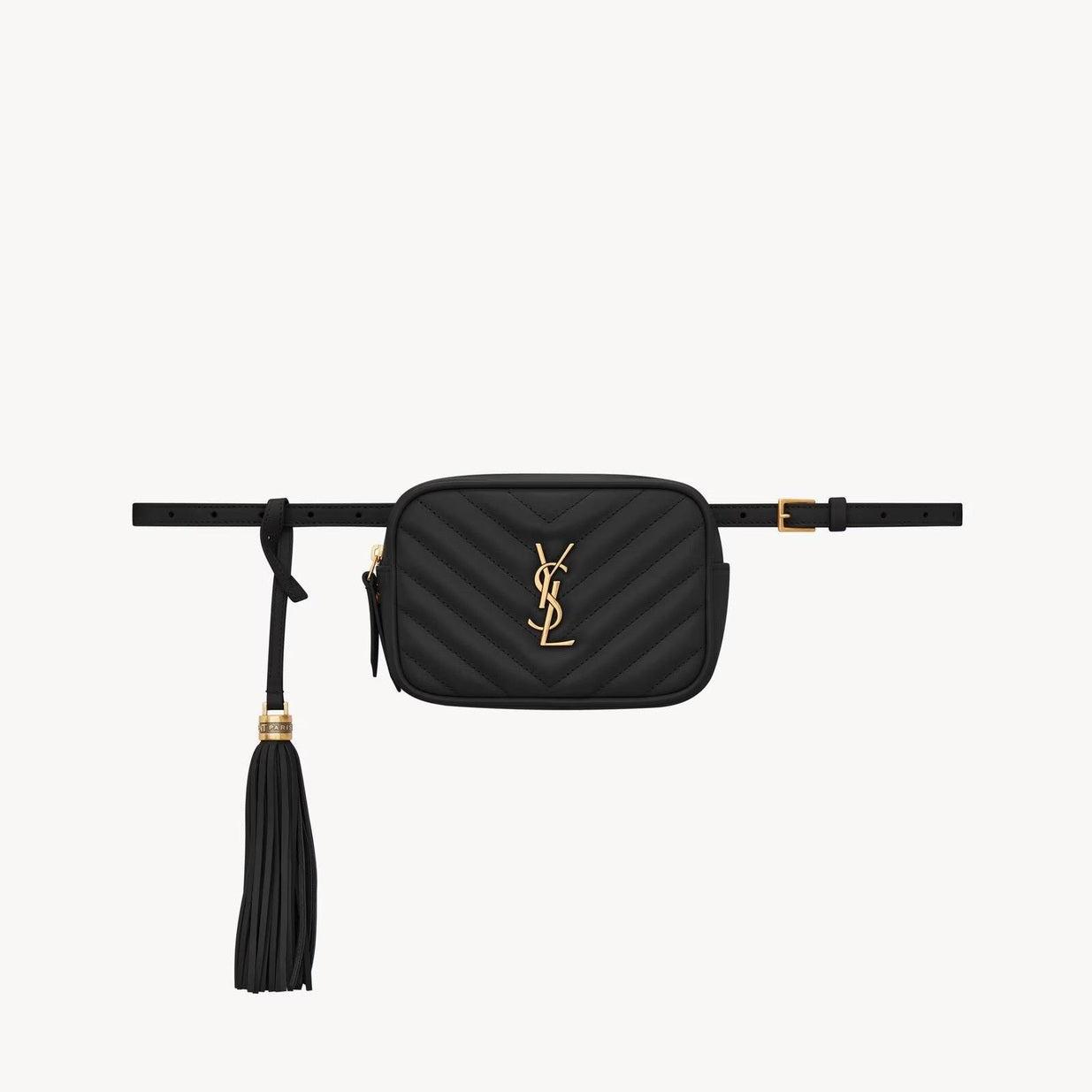 Image of Luxury black Saint Laurent belt bag with gold logo and tassel detailing.
