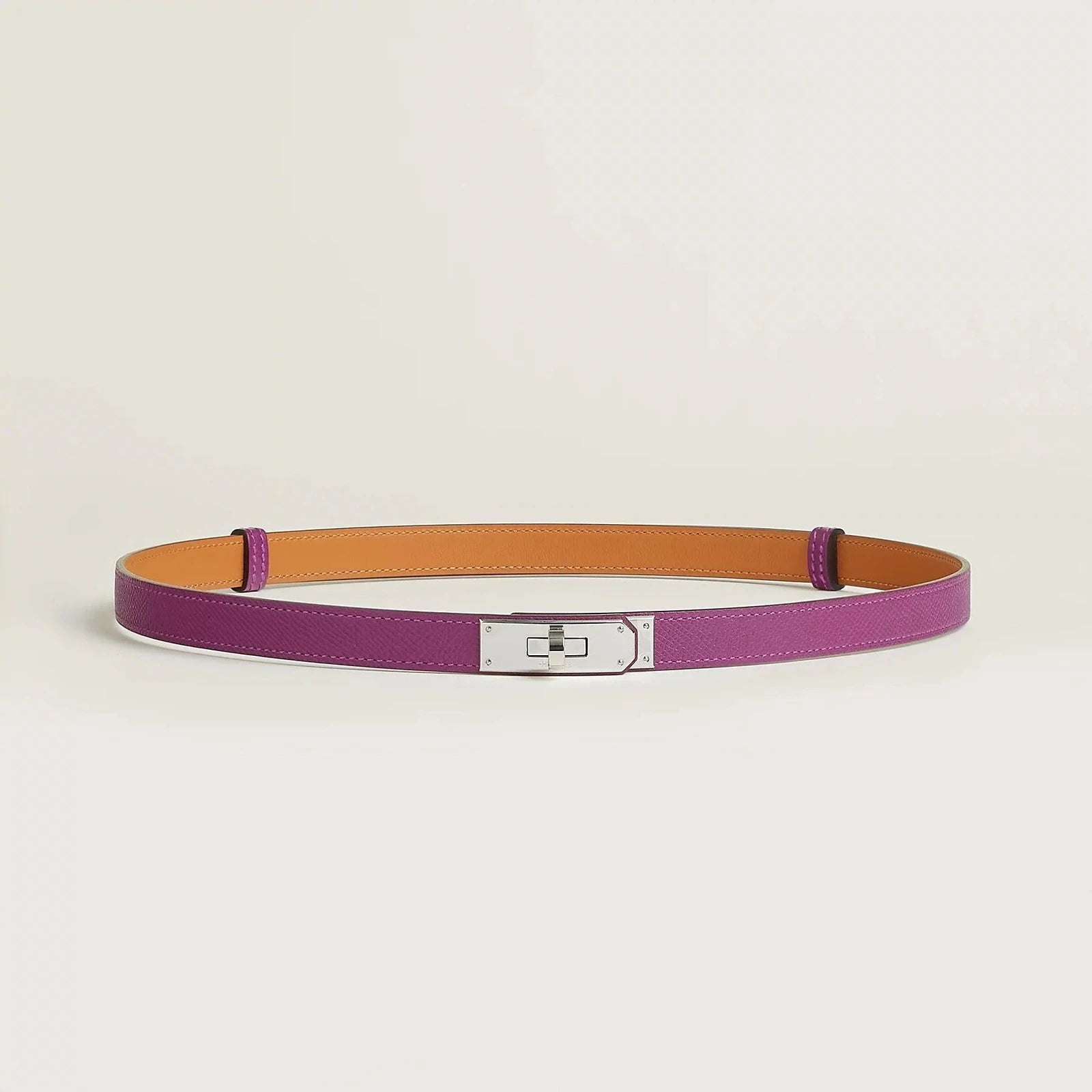 Image of Hermès Kelly leather belt in premium quality, featuring a sleek metallic buckle and minimalist design.