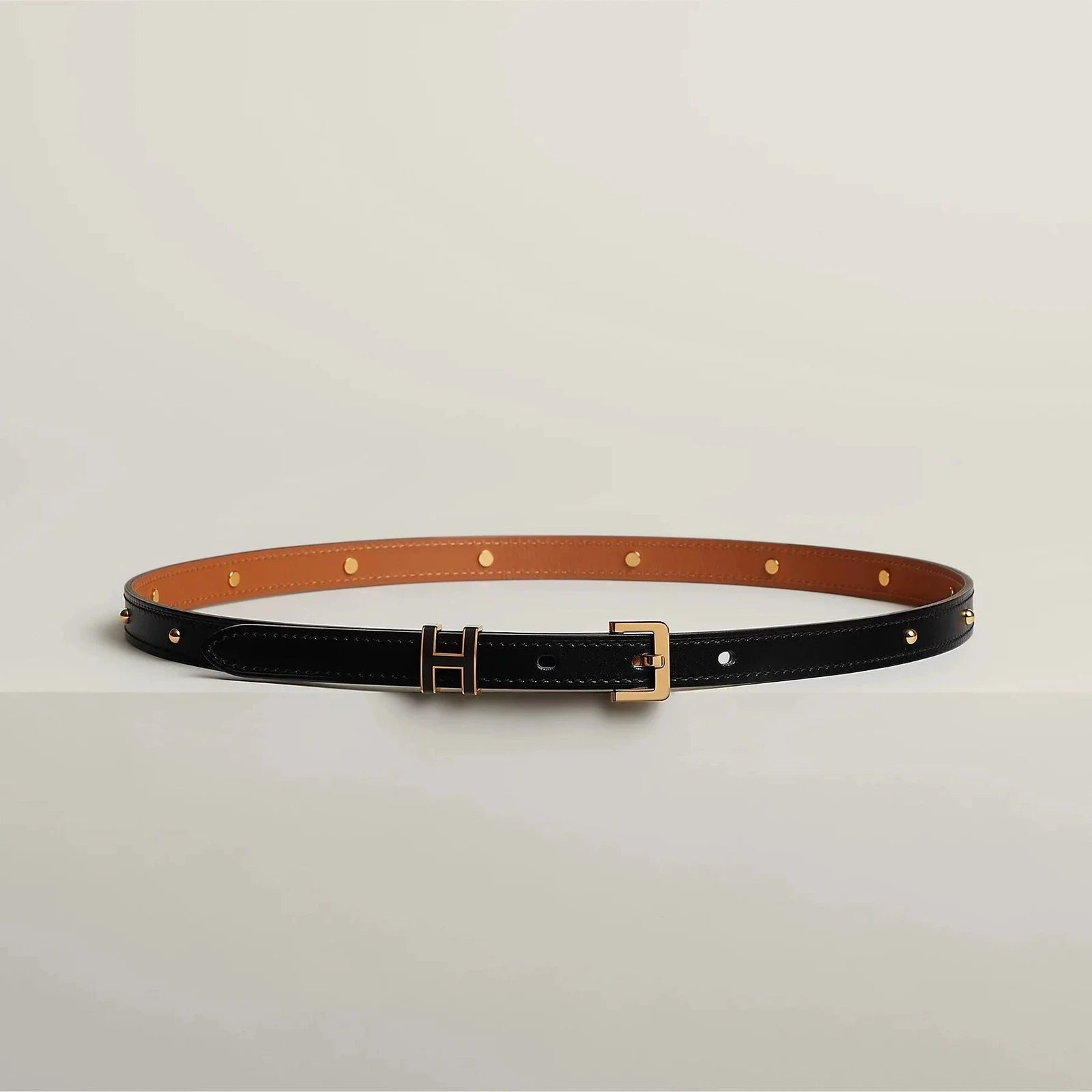 Image of Luxury Hermes leather belt with sleek metallic buckle, premium craftsmanship.