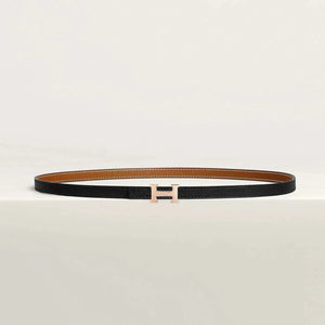 Hermès belt with elegant metallic buckle, premium quality leather, versatile for men and women.