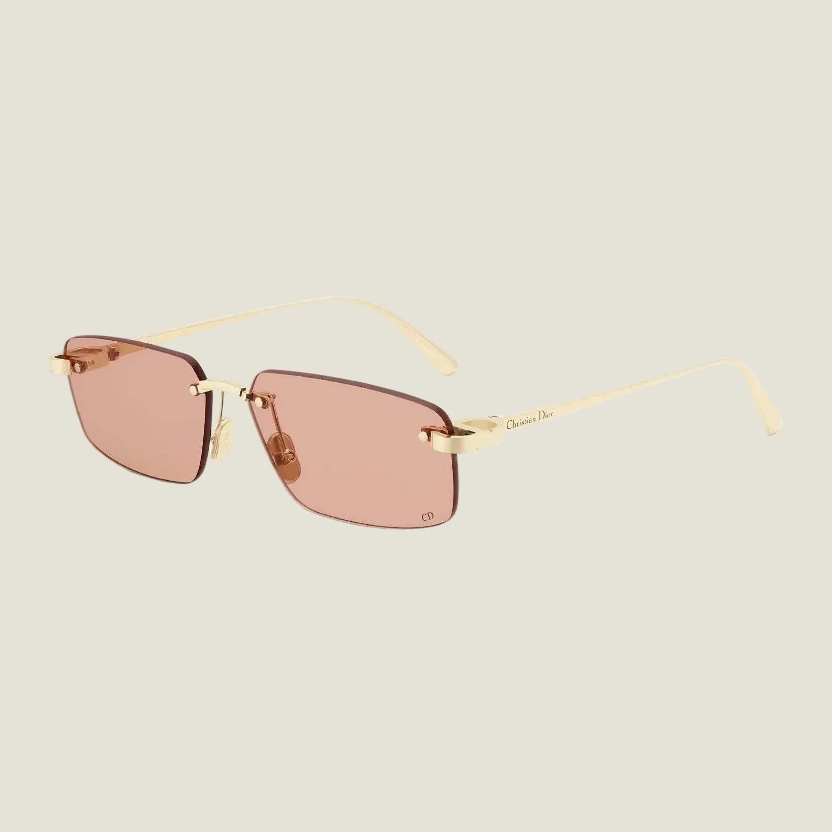 Image of Stylish Dior sunglasses with geometric rims and UV400 protection.