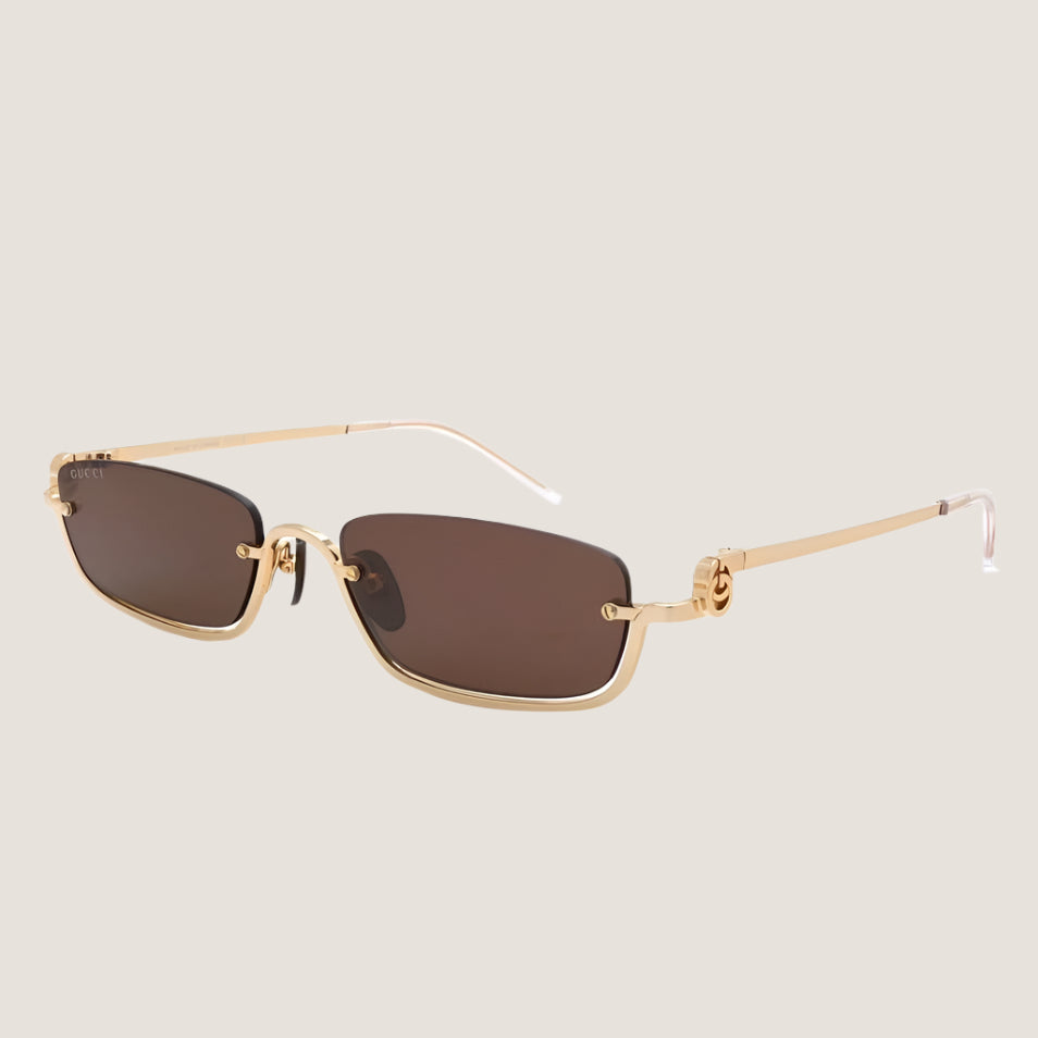 Image of Rectangular GG sunglasses with brown lenses and gold metal frame.