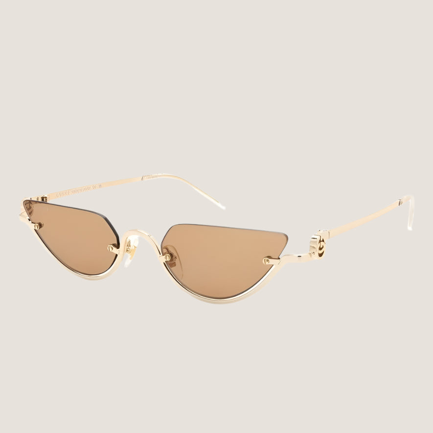 Gucci sunglasses with gold frames and brown lenses, featuring iconic luxury design, UV400 protection.