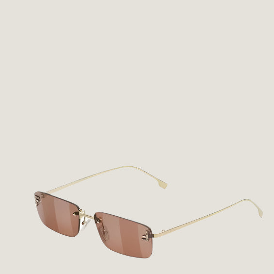 Fendi luxury sunglasses with gold frame and UV400 lenses.