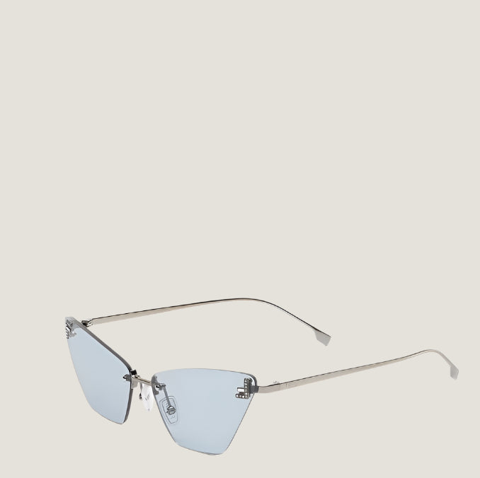Image of Fendi luxury sunglasses with sleek blue lenses and minimalist metal frame.