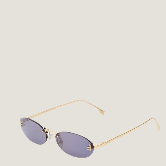 Image of Fendi luxury sunglasses with oval lenses and gold frames.