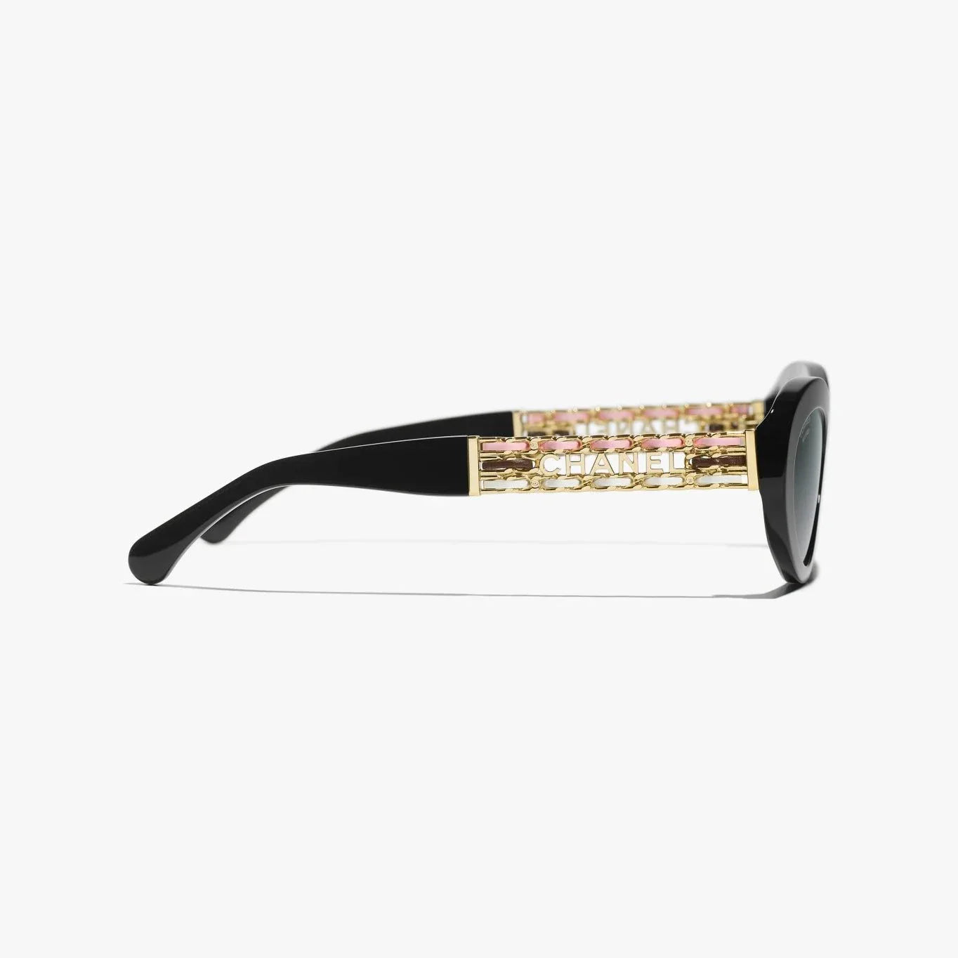 CHANEL sunglasses with black and gold plastic frame, UVA/UVB protection.