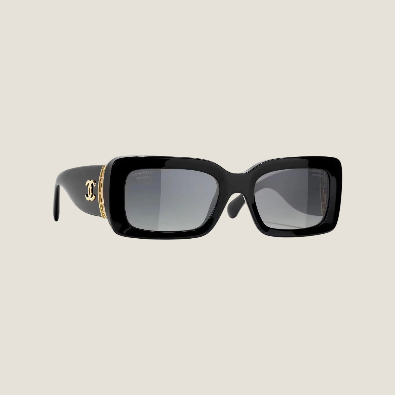 Image of Chanel sunglasses with black and gold frame, UV protection, adjustable nose pads, and replica details.