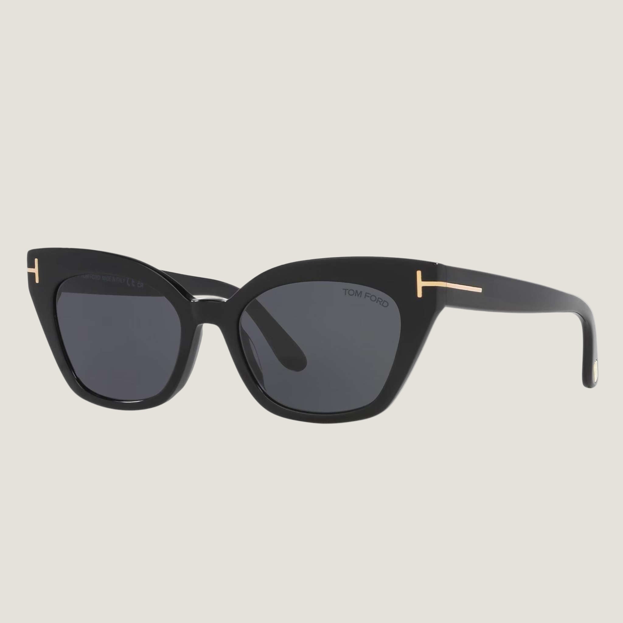 Image of TOM FORD sunglasses with black frames and UV400 protection.
