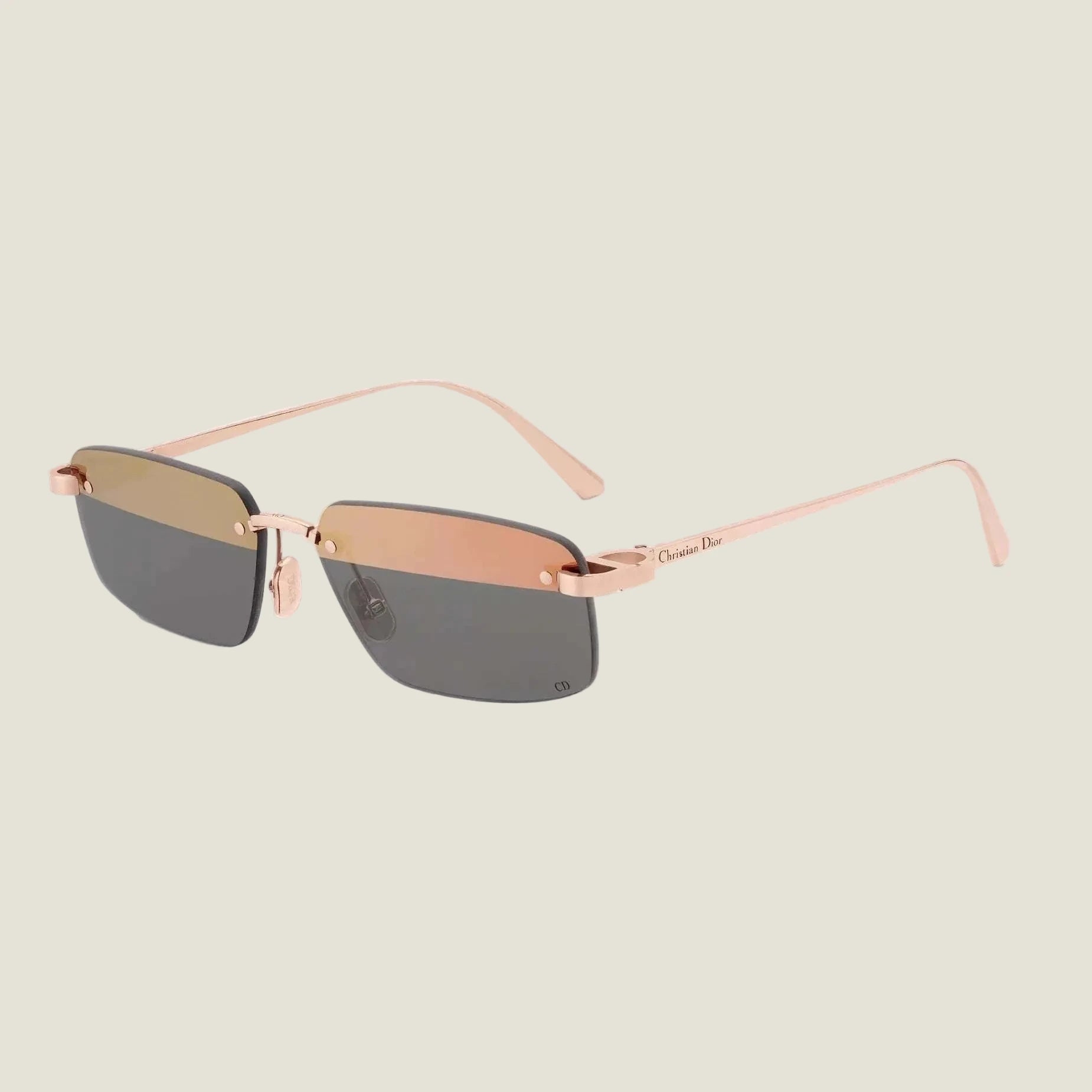 Image of Dior sunglasses with geometric design and UV400 lenses.