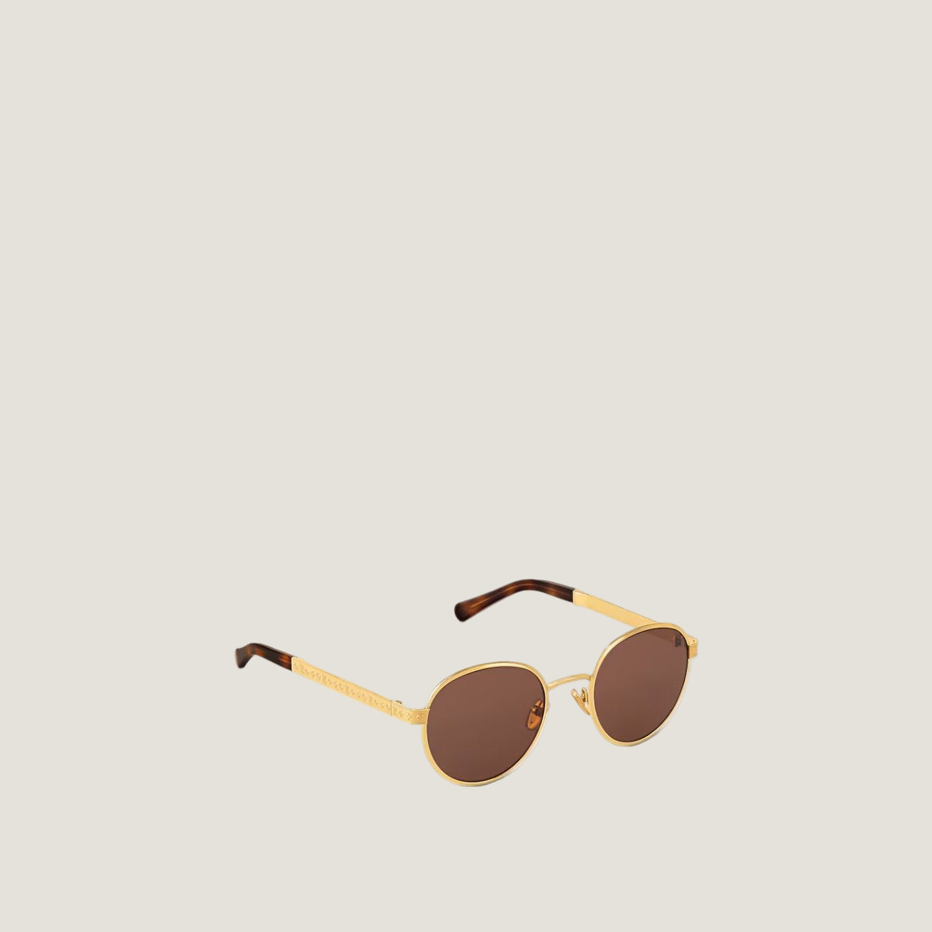 Luxury women's sunglasses with classic and modern design, offering UV protection and comfort.
