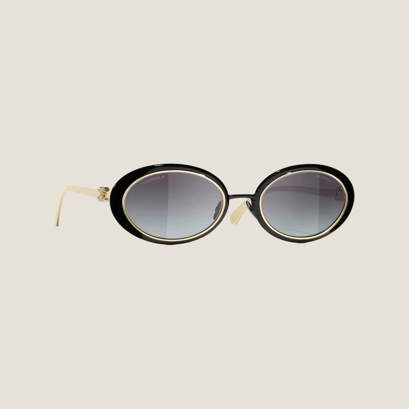 CHANEL sunglasses with elegant design and UV protection.
